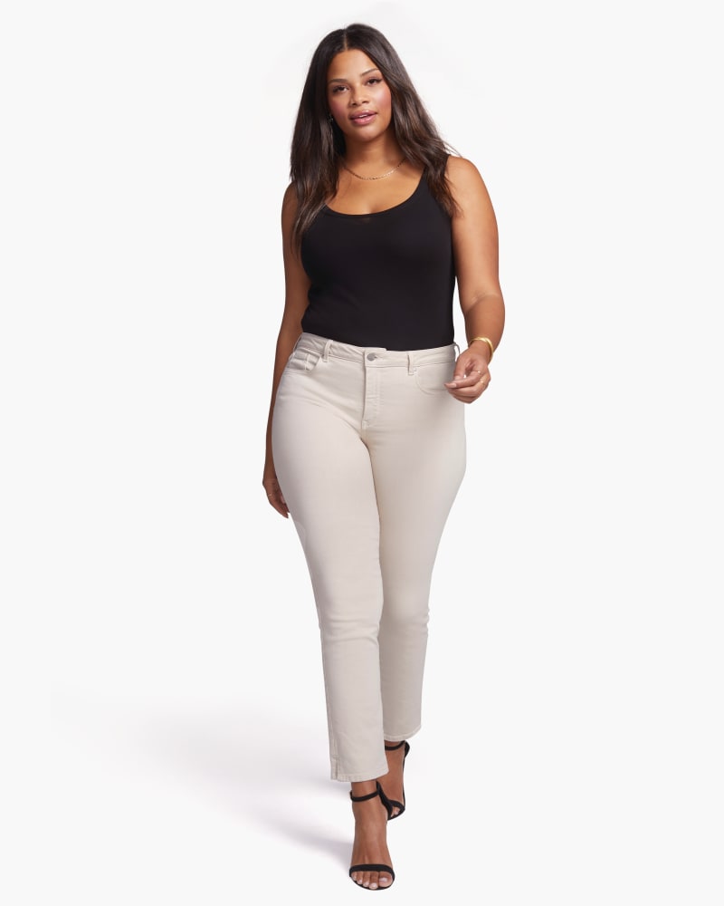 Front of a model wearing a size 22 Stephanie Slim Straight Ankle Jeans in Feather by NYDJ. | dia_product_style_image_id:166367